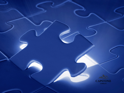 Puzzle with a missing piece being placed, featuring the Capstone Copilot logo to symbolize clarity and solving operational challenges.